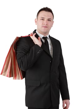 Image of a young businessman with a shopping bag isolated against a white background.