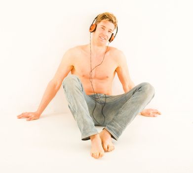 bare-chested man with headphones