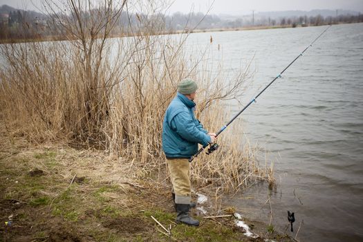Angler casting his rod