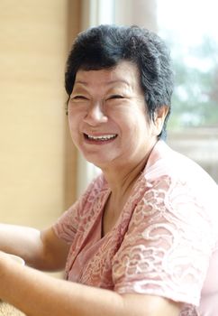 Happy 60s Senior Asian Woman