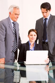 businessmen and businesswoman during a meeting