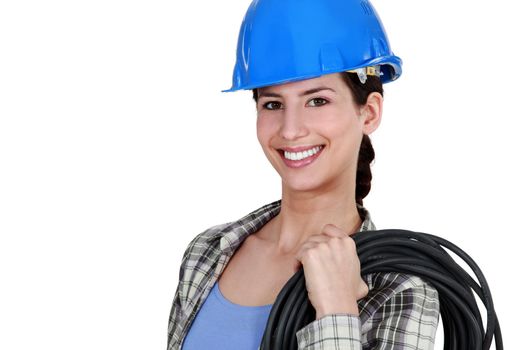 Female electrician with coil