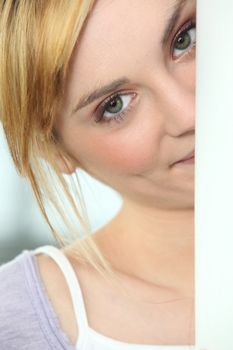 Blond woman with mischievous gaze