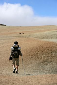 Man backpacking in the steppe