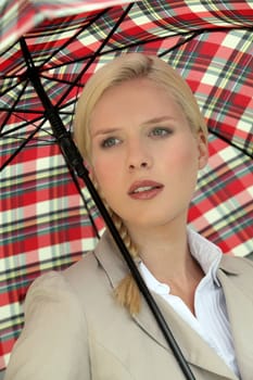 elegant woman holding an umbrella