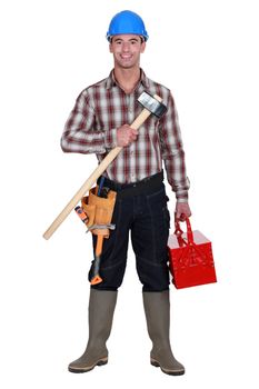 Labourer carrying tool-box