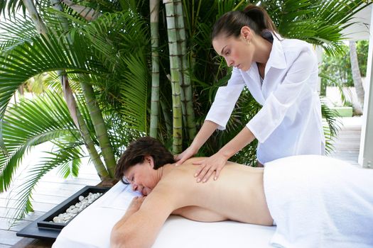 Woman receiving soothing back massage