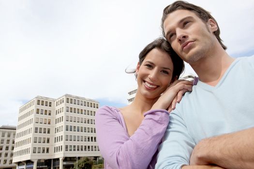 Man and woman in front of an office block