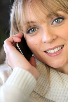 Attractive woman talking on her mobile phone