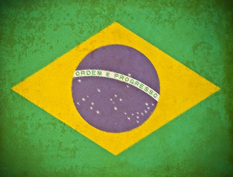 old grunge paper with Brazil flag background
