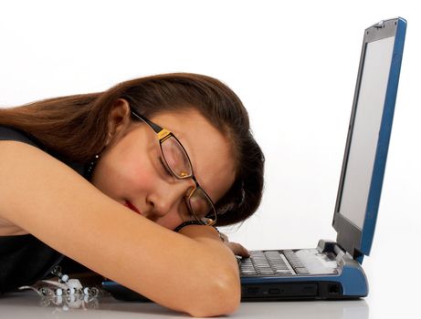 Girl Taking A Nap On Her Notebook Computer As Exhausted