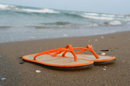 Sandals at the beach. on a hot day
