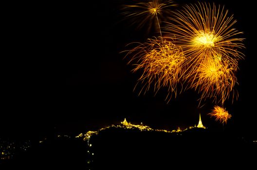 fireworks display above Thai temple on the hill