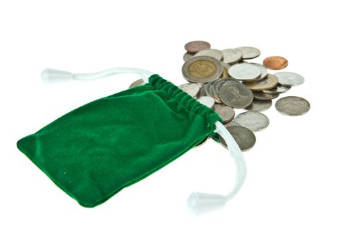 Green velvet pouch with coins isolated on white background