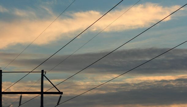 Power lines at sunrise