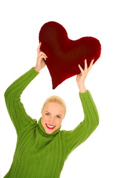 Woman with heart-shaped pillow