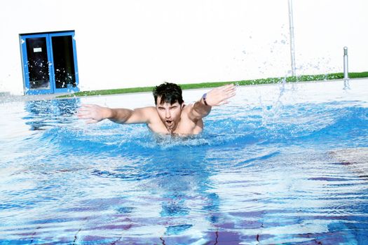 dynamic swimmer in swimming pool