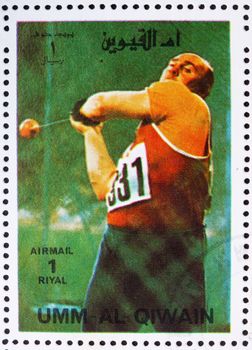 UMM AL-QUWAIN - CIRCA 1972: a stamp printed in the Umm al-Quwain shows Hammer Throwing, Athletics, Summer Olympics, Munich 1972, circa 1972