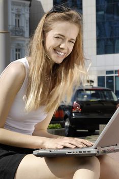 happy student with laptop