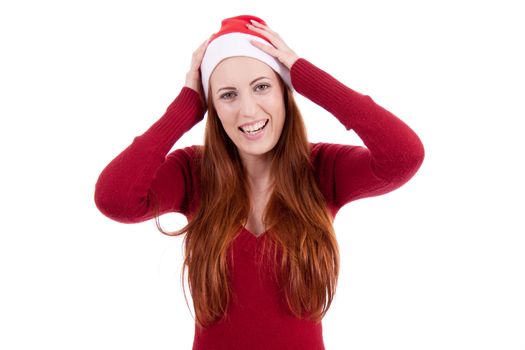 smiling young woman at christmastime in red clothes isolated