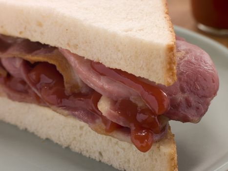 Bacon Sandwich on White Bread with Tomato Ketchup