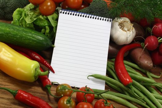 shopping list with fresh vegetables