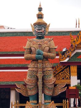Giant guardian in the Temple of the Emerald Buddha, Bangkok.