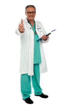 Thumbs up from senior medical professional