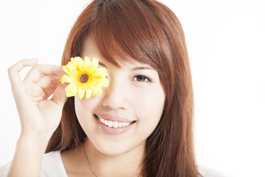 Young smiling asian woman with flower