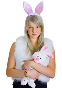 Young blonde in a fancy-dress with toy rabbit