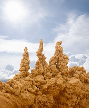 Sand castles on sky background