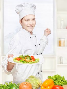 chef offering vegetarian meal