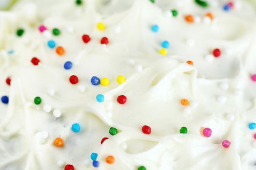 Cream cheese frosting and candy background