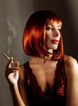 Beautiful woman smoke cigarette