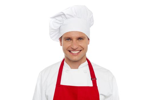 Half length portrait of smiling male chef