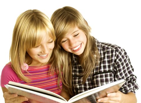 Two Teenage Girls reading The Book.Education