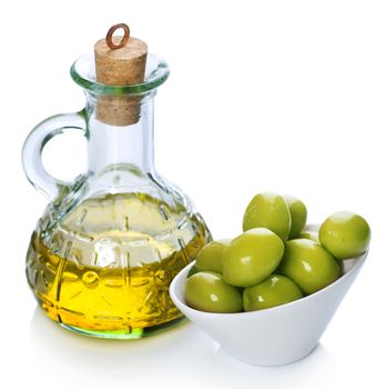 Extra Virgin Olive Oil and Green Olives over white