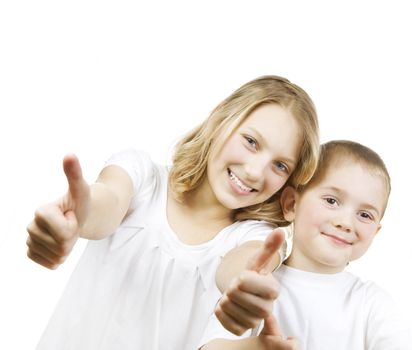 Happy Kids Sister and Brother with thumbs up. Isolated on a whit