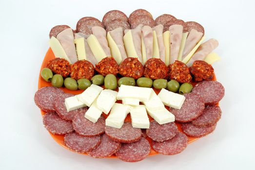 Catering food with delicatessen cheese and olives