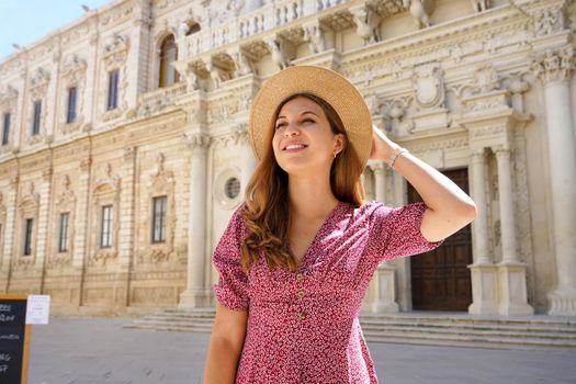 Fashionable young woman visiting the city of Lecce in Italy in her cultural tour in Europe