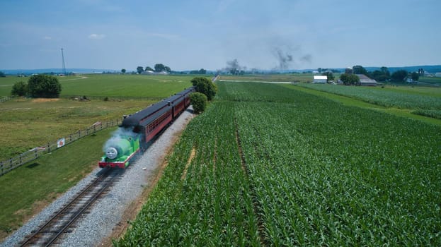 Aerial View of Percy the Tank Engine Approaching Thru Farmlands