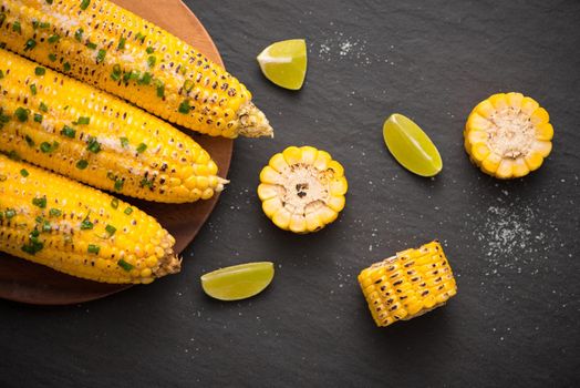 Tasty sweet grilled corn with salt and lime.