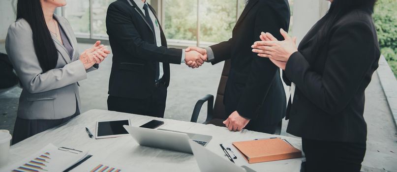Business Partners Executive Greetings Handshake After Conference Agreement Deal Together, Businesspeople Executive Shaking Hands Togetherness in Meeting Room., Business Partnership Team Concept.