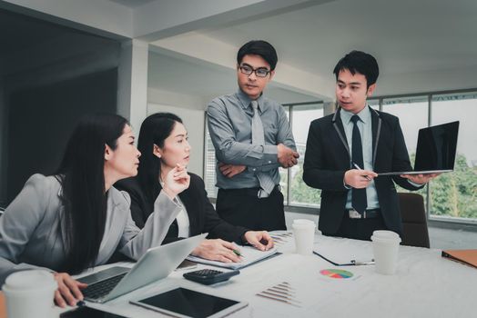 Business People Executive Team Meeting Report Presentation and Discussing in Meeting Room Together, Group of Business Executive Teamwork are Conference Corporate Marketing in Office Togetherness.
