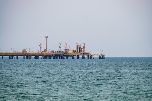 An oil pipeline and a dock for oil tankers.