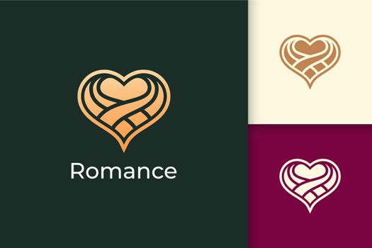Abstract luxury love logo represent romance or relation with gold color
