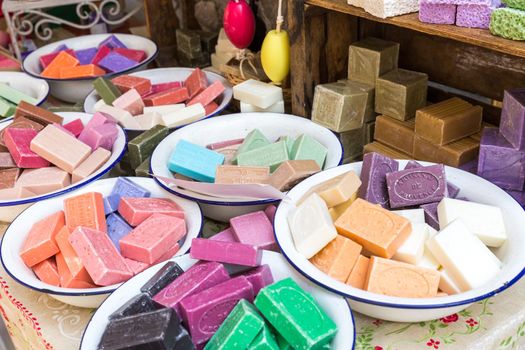 Natural soap on the counter of the city sunday market in Parma Italy