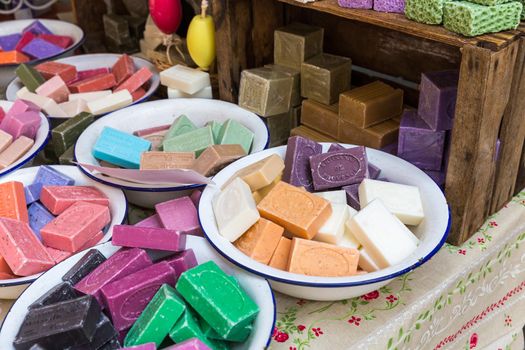 Natural soap on the counter of the city sunday market in Parma Italy