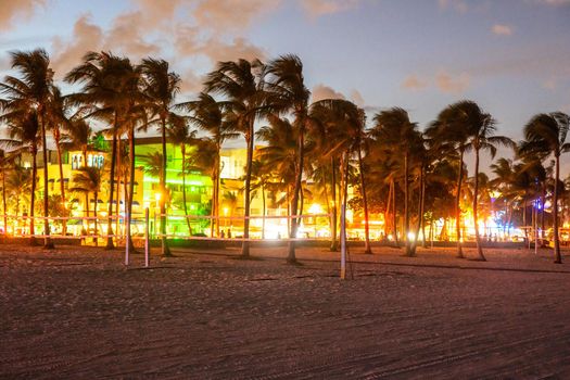 Miami Beach, USA - September 10, 2019: Ocean Drive Miami Beach at sunset. City skyline with palm trees at dusk. Art deco on South beach