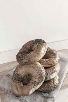 Bagels with poppy seeds on a napkin